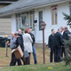 Police officers investigate the scene where authorities say Amonderez Green shot himself after exchanging gunfire with the police Oct. 28, 2015, in St. Louis County.
Chris Lee/St. Louis Post-Dispatch via AP